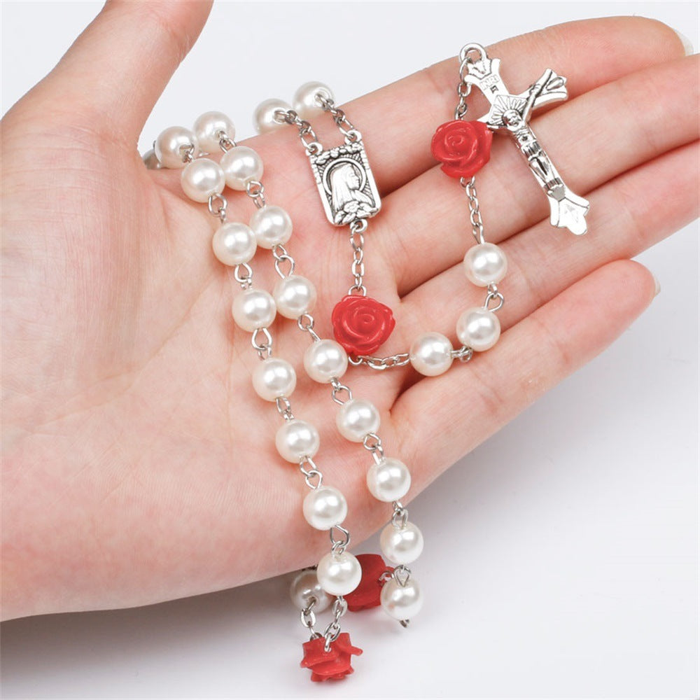 Glass imitation pearl catholic cross necklace